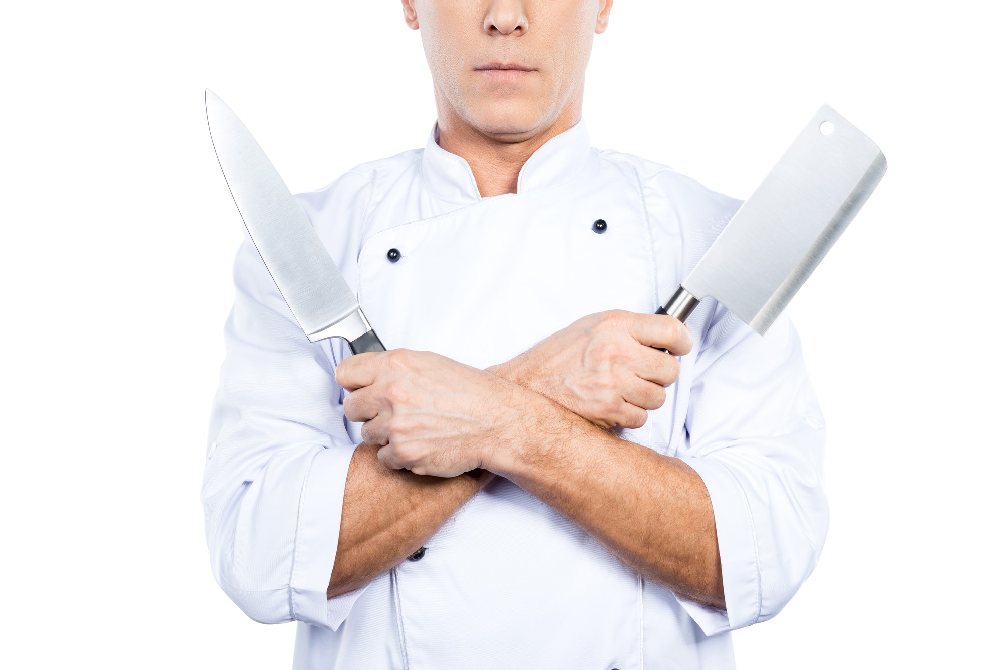 Chef insegna tecniche di taglio su banco professionale